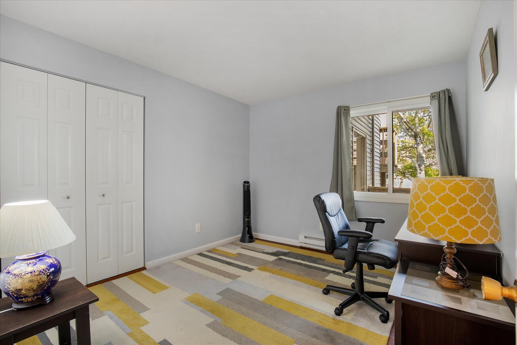 800 Bearses Way, Unit 1EB Hyannis, MA 02601 - Photo 16 of 37 a workspace with furniture and window