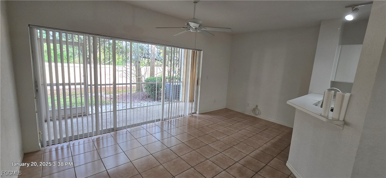 8541 Athena Court Lehigh Acres, FL 33971 - Photo 2 of 47 a view of empty room with wooden floor