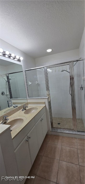 8541 Athena Court Lehigh Acres, FL 33971 - Photo 23 of 47 a bathroom with a granite countertop sink a shower and a mirror
