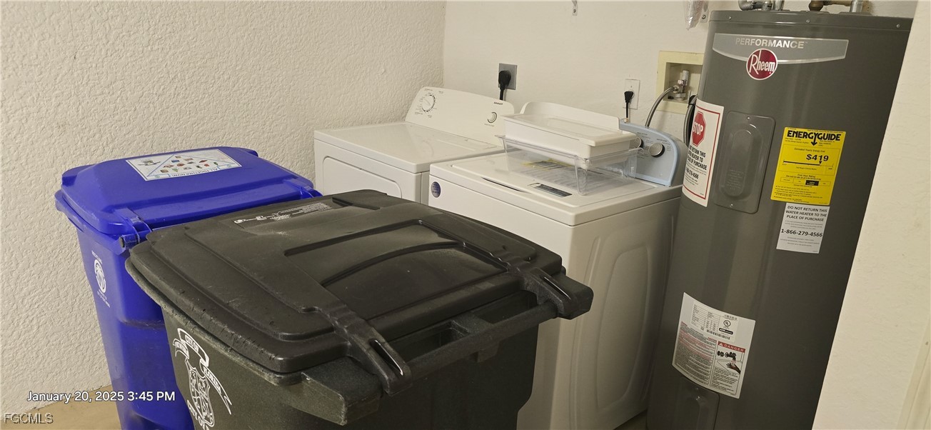 8541 Athena Court Lehigh Acres, FL 33971 - Photo 27 of 47 a utility room with dryer and washer