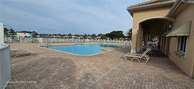 a view of a terrace with sitting area