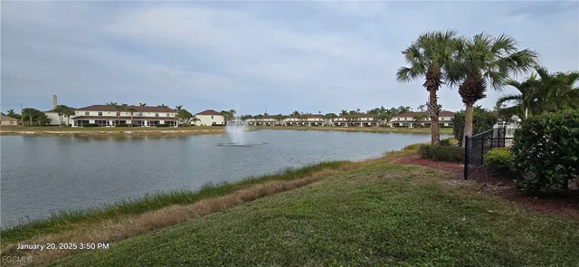 an aerial view of a houses with ocean view