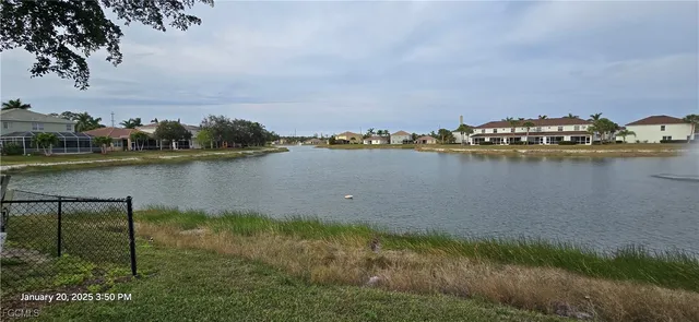 a wooden bench sitting in the middle of a park