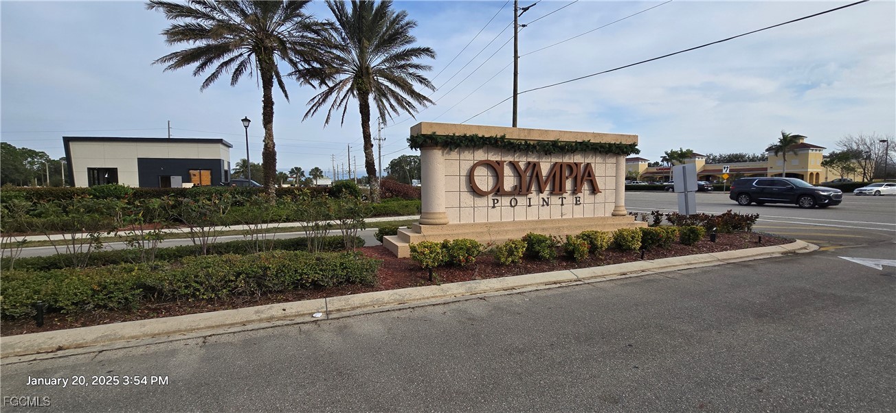 8541 Athena Court Lehigh Acres, FL 33971 - Photo 45 of 47 a sign on the side of a road