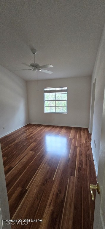 8541 Athena Court Lehigh Acres, FL 33971 - Photo 6 of 47 wooden floor in an empty room