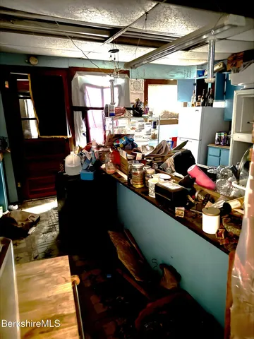 a room with furniture and a chandelier