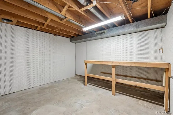 a view of room with racks on the wall