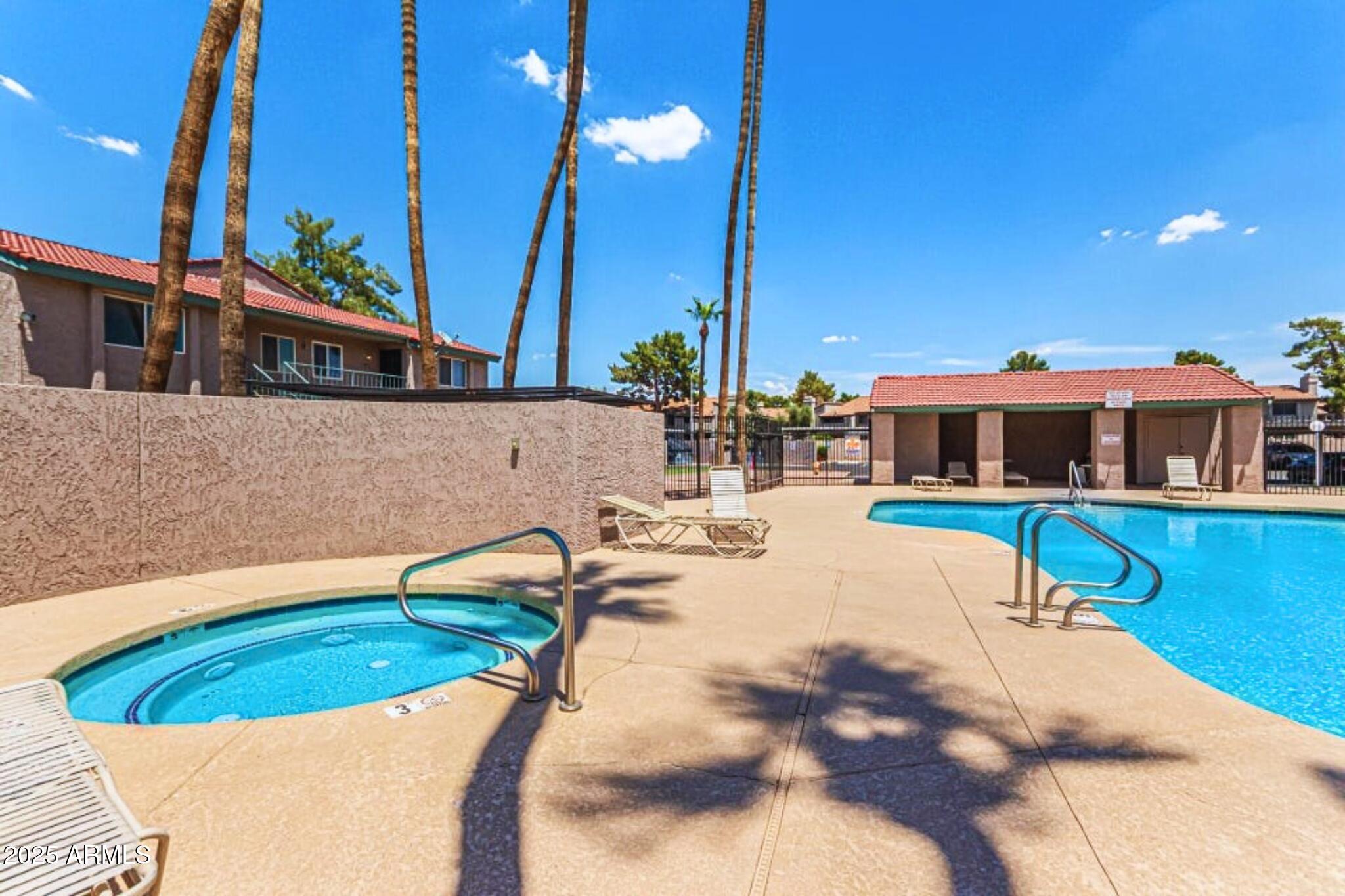 623 West Guadalupe Road, Unit 261 Mesa, AZ 85210 - Photo 19 of 24 a view of a house with swimming pool
