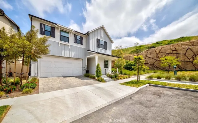 a view of tall buildings with street