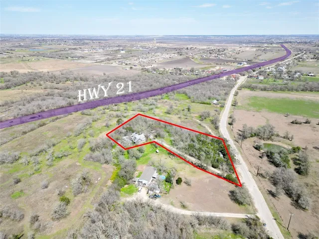 an aerial view of beach and ocean