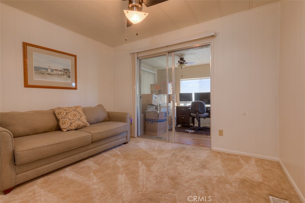 1901 Dayton Road, Unit 133 Chico, CA 95928 - Photo 21 of 36 a living room with furniture and a large window