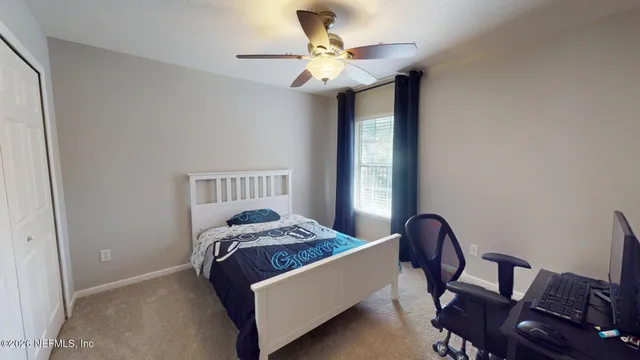 a view of a hallway with washer and dryer