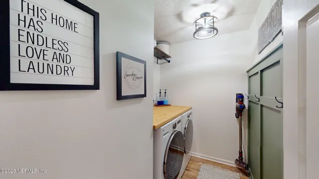 a view of a house with backyard porch and sitting area