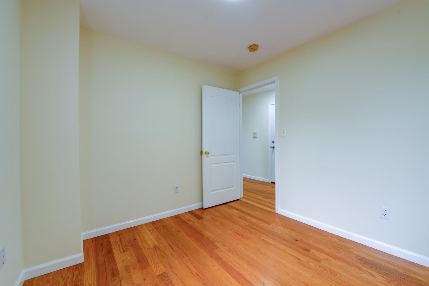 190 Terrace Avenue, Unit 2 Jersey City, NJ 07307 - Photo 15 of 29 a view of empty room with wooden floor