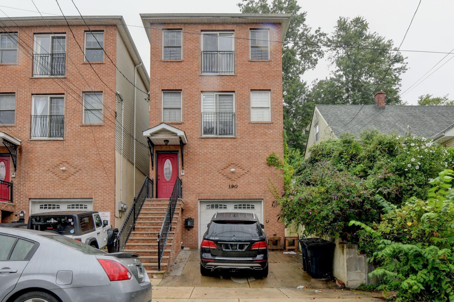 190 Terrace Avenue, Unit 2 Jersey City, NJ 07307 - Photo 29 of 29 a car parked in front of a house