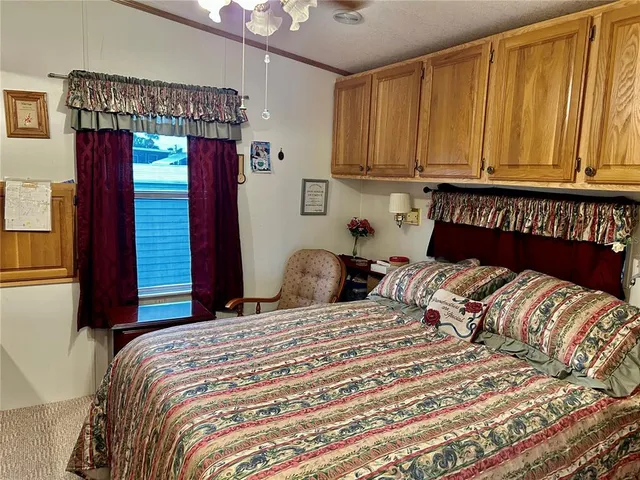 a bedroom with a bed and a closet