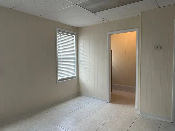 an empty room with windows