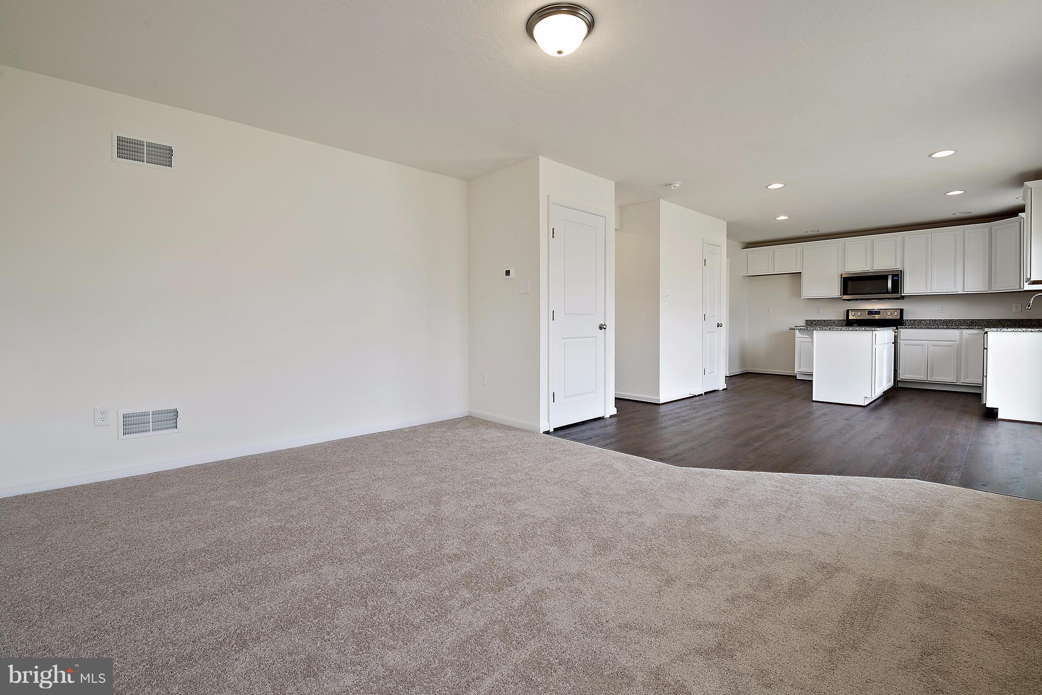 865 Ripple Drive, Unit 65 Hanover, PA 17331 - Photo 14 of 26 Family Room/Breakfast/Kitchen