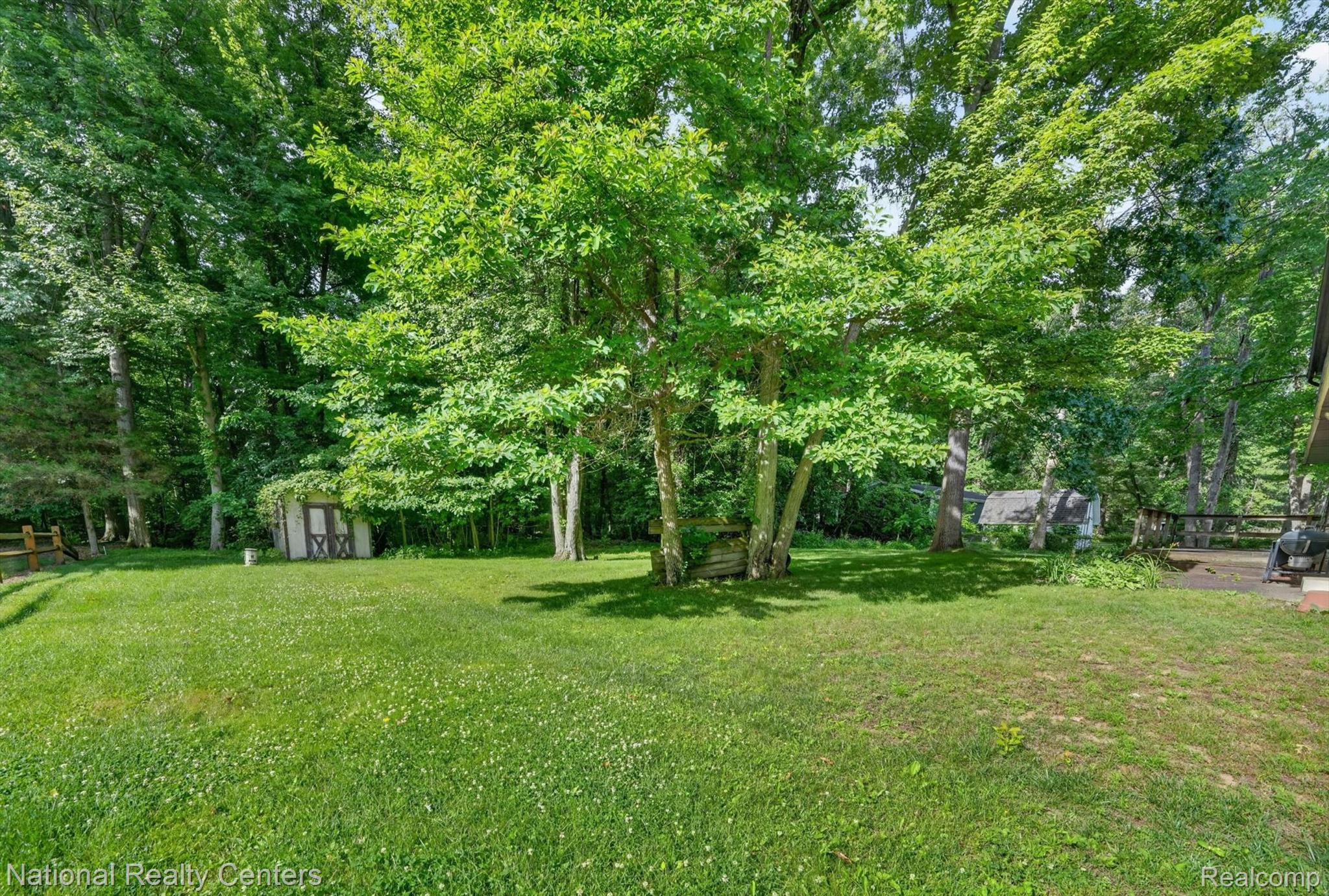 3107 Dean Road Lambertville, MI 48144 - Photo 42 of 45 Spacious yard area featuring established trees providing natural shading
