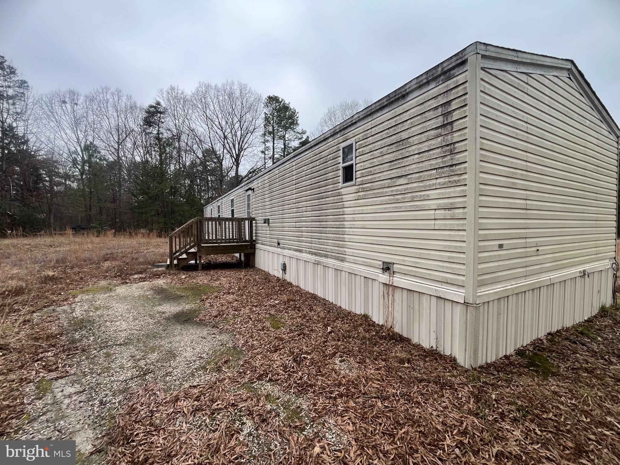 Secluded mobile home on a quiet lot.