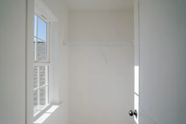 a bathroom with a bathtub and toilet