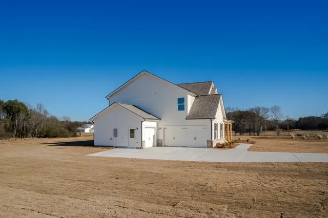 a view of a brick wall of building from a porch