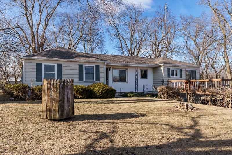 2686 Lundgren Road Pecatonica, IL 61063 - Photo 1 of 58 a view of a house with a yard covered in snow
