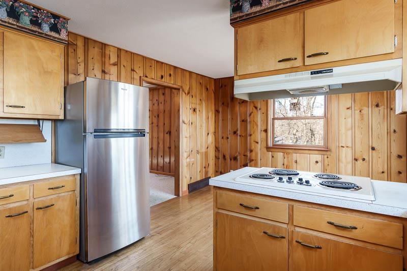 2686 Lundgren Road Pecatonica, IL 61063 - Photo 12 of 58 a kitchen with appliances cabinets and a counter top space