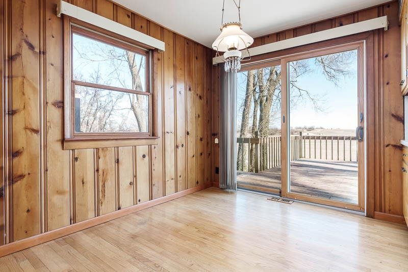 2686 Lundgren Road Pecatonica, IL 61063 - Photo 17 of 58 wooden floor in an empty room with a window