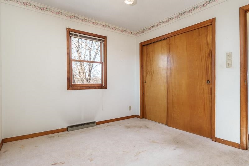 2686 Lundgren Road Pecatonica, IL 61063 - Photo 24 of 58 a view of an empty room with a window