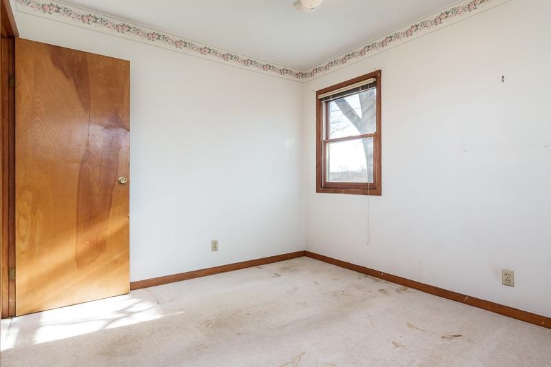 2686 Lundgren Road Pecatonica, IL 61063 - Photo 25 of 58 an empty room with a window