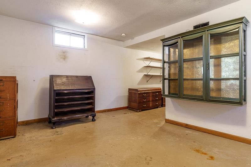 2686 Lundgren Road Pecatonica, IL 61063 - Photo 35 of 58 a view of an empty room with furniture and windows
