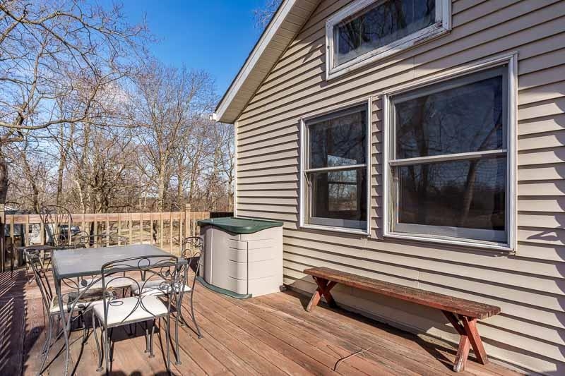 2686 Lundgren Road Pecatonica, IL 61063 - Photo 42 of 58 a view of a chair and table in the balcony