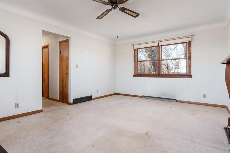 2686 Lundgren Road Pecatonica, IL 61063 - Photo 7 of 58 a view of an empty room with a window
