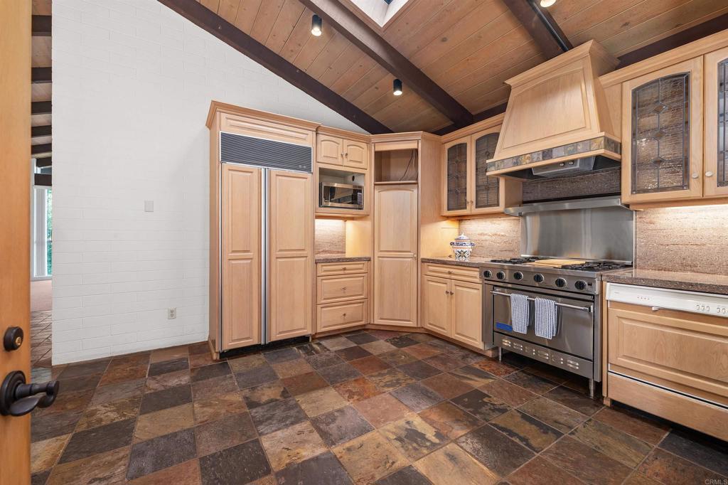 16522 Orchard Bend Road Poway, CA 92064 - Photo 8 of 26 a kitchen with stainless steel appliances granite countertop a stove and a refrigerator