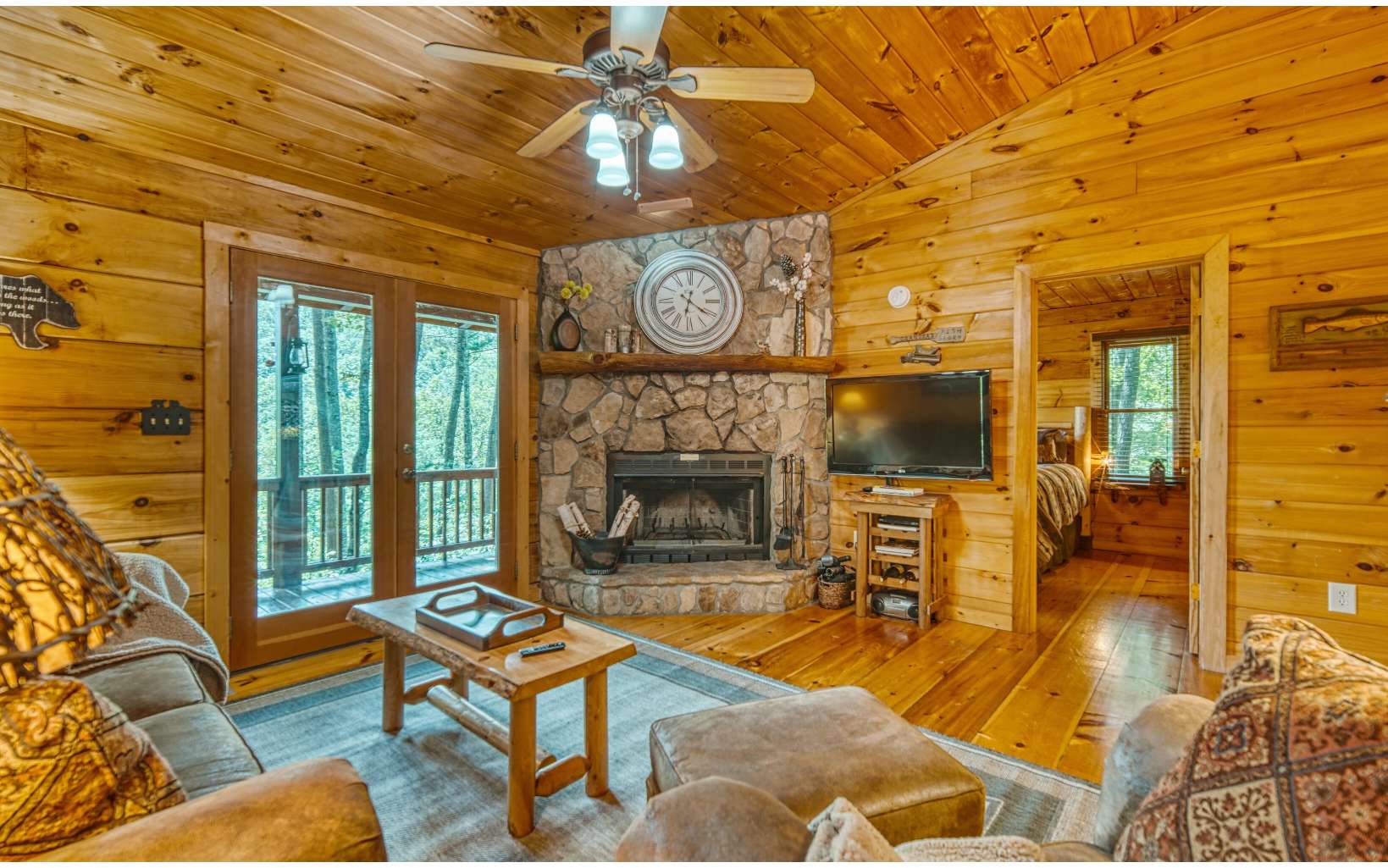 206 Mountain View Road Cherry Log, GA 30522 - Photo 14 of 49 a living room with fireplace furniture and a large window