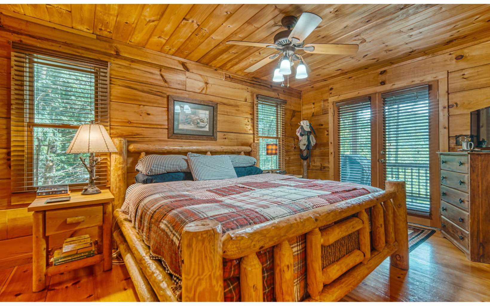 206 Mountain View Road Cherry Log, GA 30522 - Photo 20 of 49 a bed sitting in a bedroom next to a window