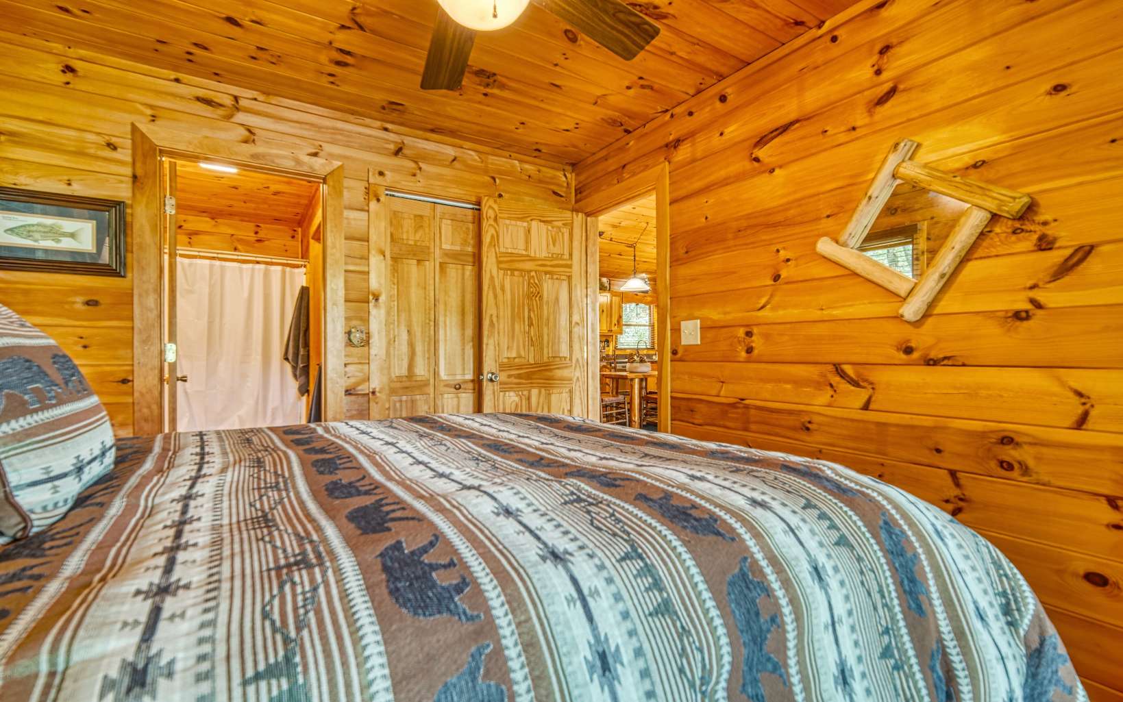 206 Mountain View Road Cherry Log, GA 30522 - Photo 25 of 49 a bed sitting in a bedroom next to a window