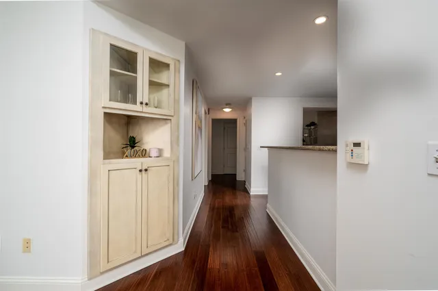 a kitchen with a sink and a refrigerator