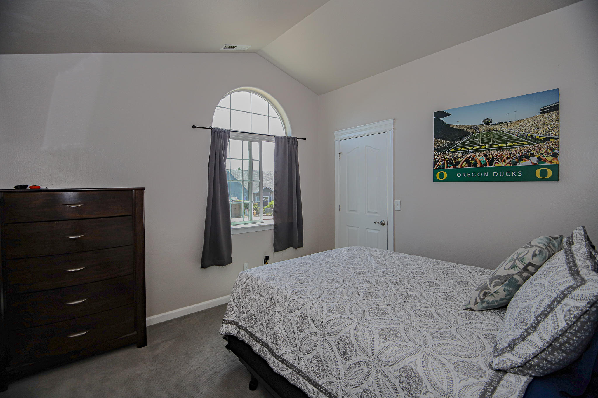 623 Barton Road Eagle Point, OR 97524 - Photo 16 of 28 a bedroom with a bed and a window