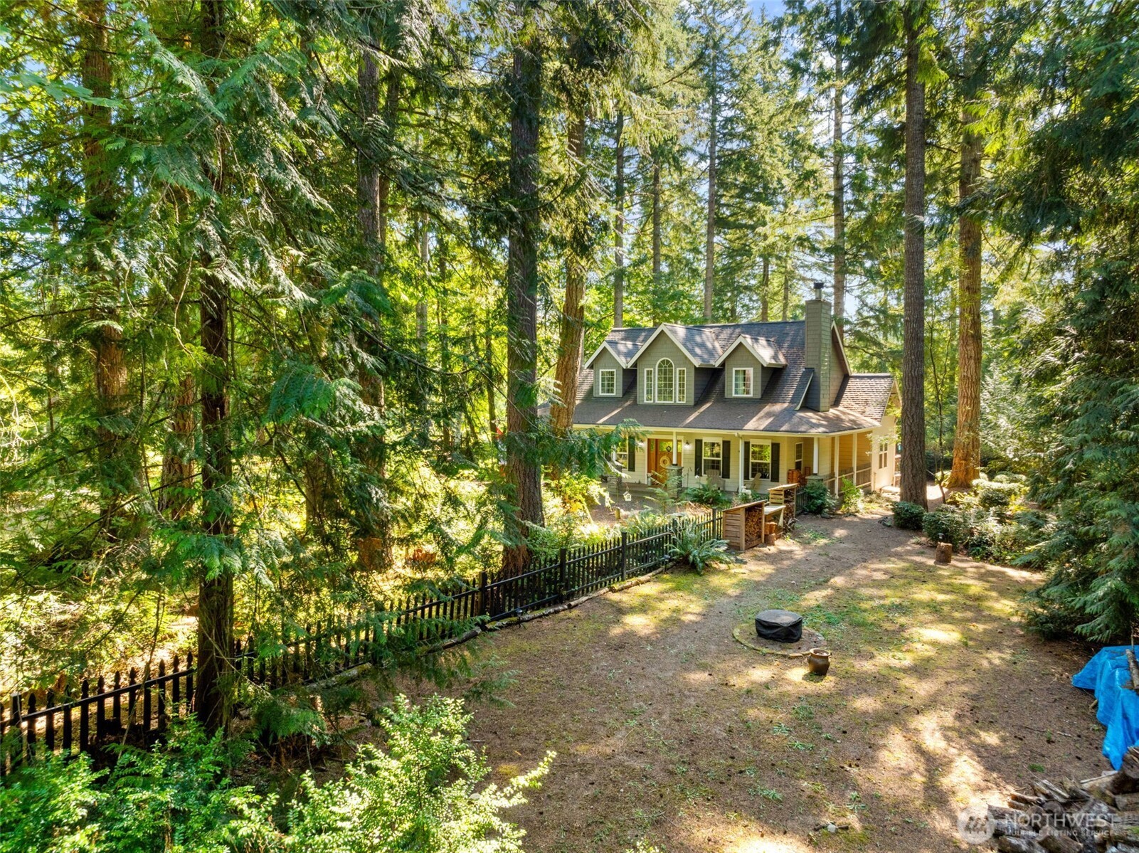 1130 East Sunset Hill Road Shelton, WA 98584 - Photo 39 of 40 a view of a house with a yard