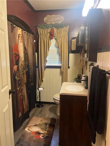 a room with a sink and a mirror