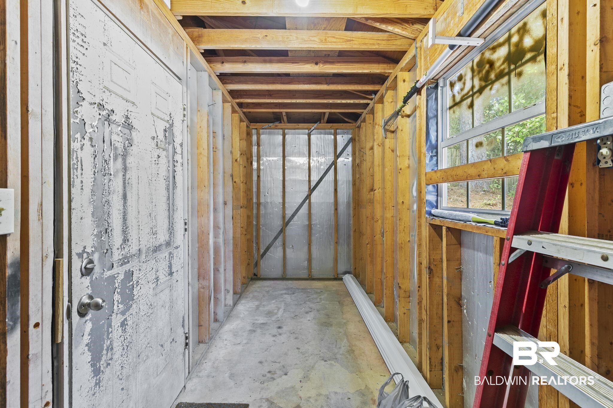 359 Ridgewood Drive Daphne, AL 36526 - Photo 52 of 73 Large storage area attached to carport