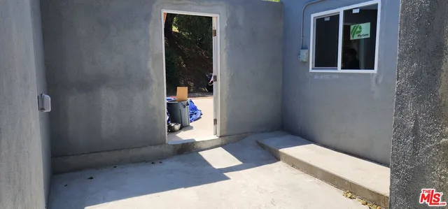 a front view of a house with entryway