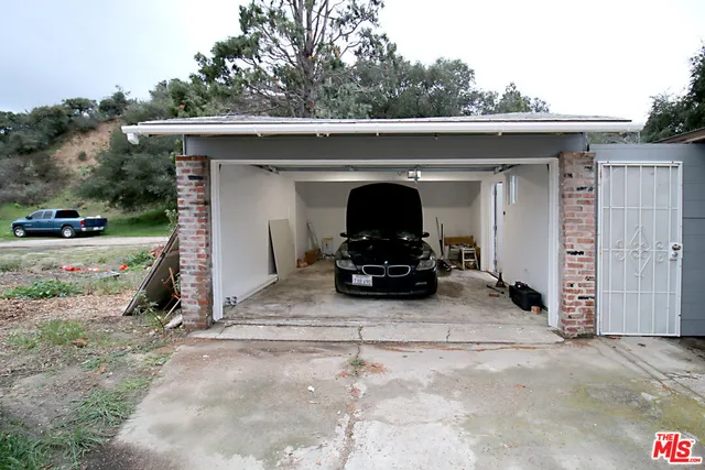 a view of car parked in garage