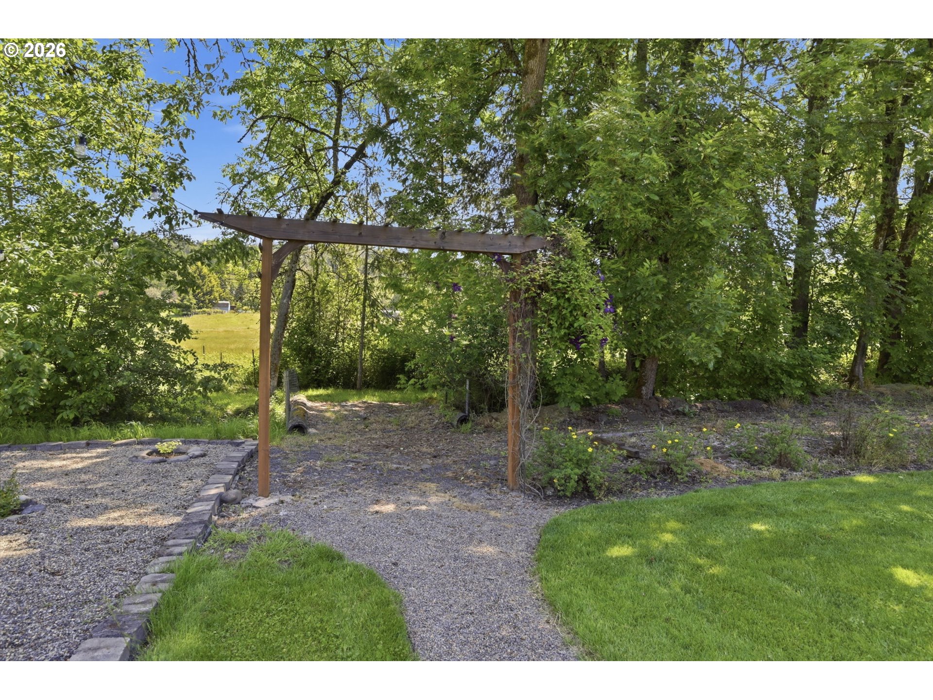 29778 Gimpl Hill Road Eugene, OR 97405 - Photo 36 of 43 a view of a yard with a tree