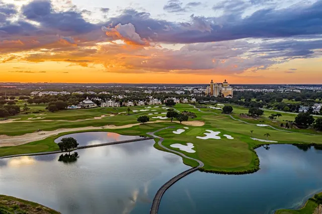 a view of a golf course with a swimming pool