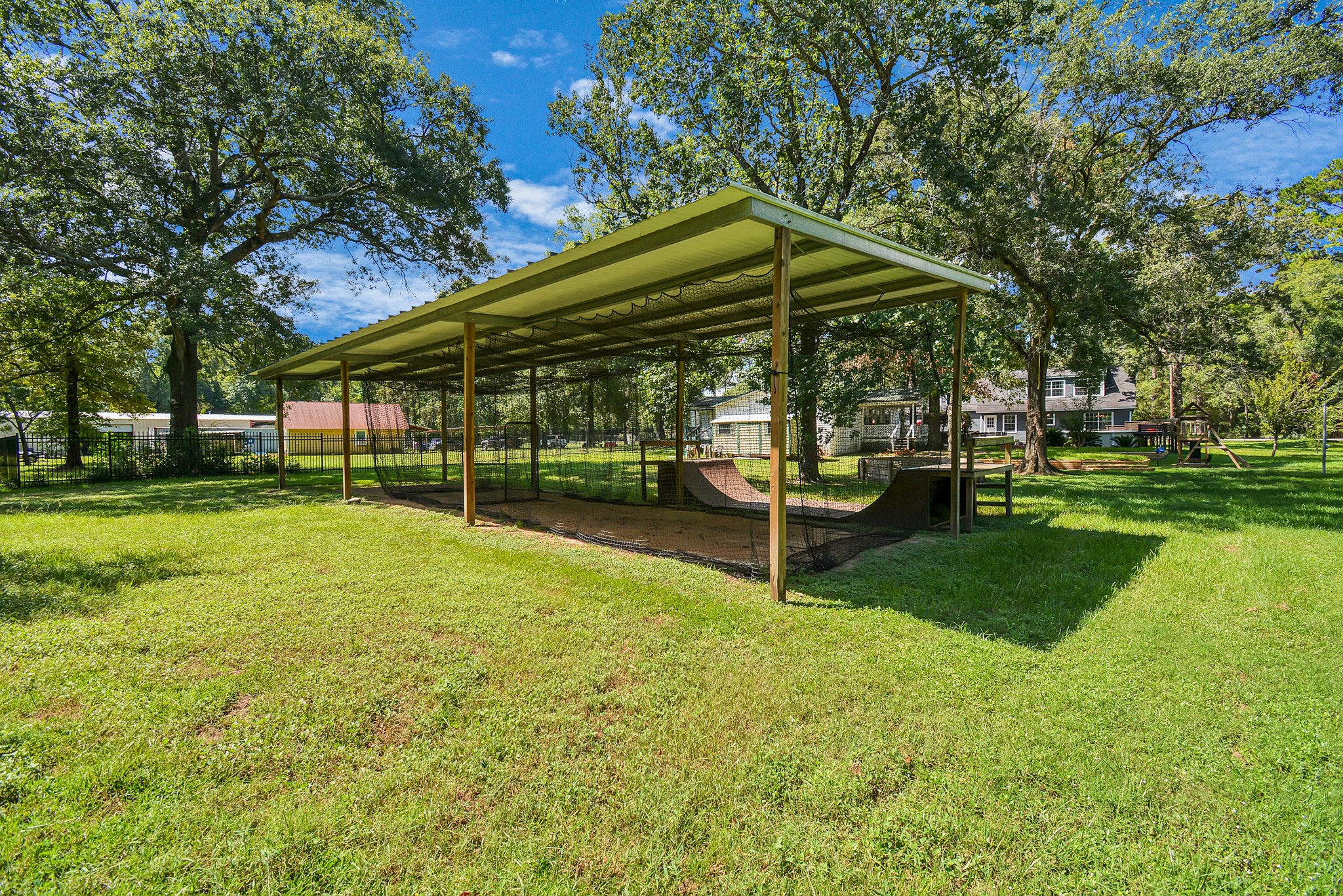 22936 Mossy Oaks Road Spring, TX 77389 - Photo 27 of 50 17X60 Batting Cage & skateboard ramps among the many activities offered