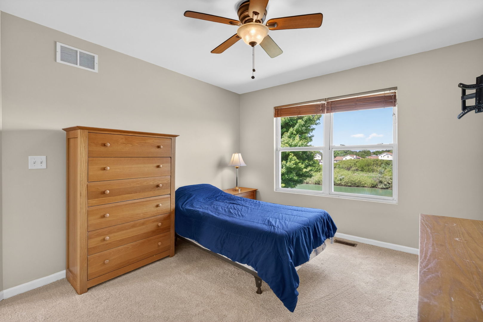 25204 Spring Street Manhattan, IL 60442 - Photo 22 of 34 a bedroom with a bed and a window