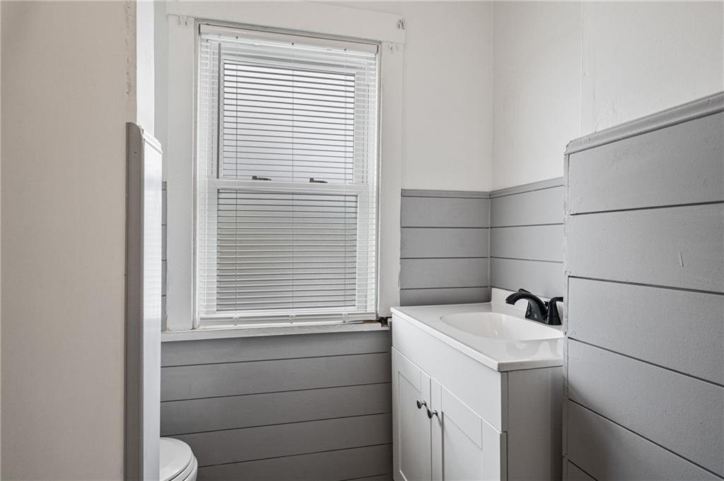 1716 Davidson Street Aliquippa, PA 15001 - Photo 17 of 34 a bathroom with a sink and a window